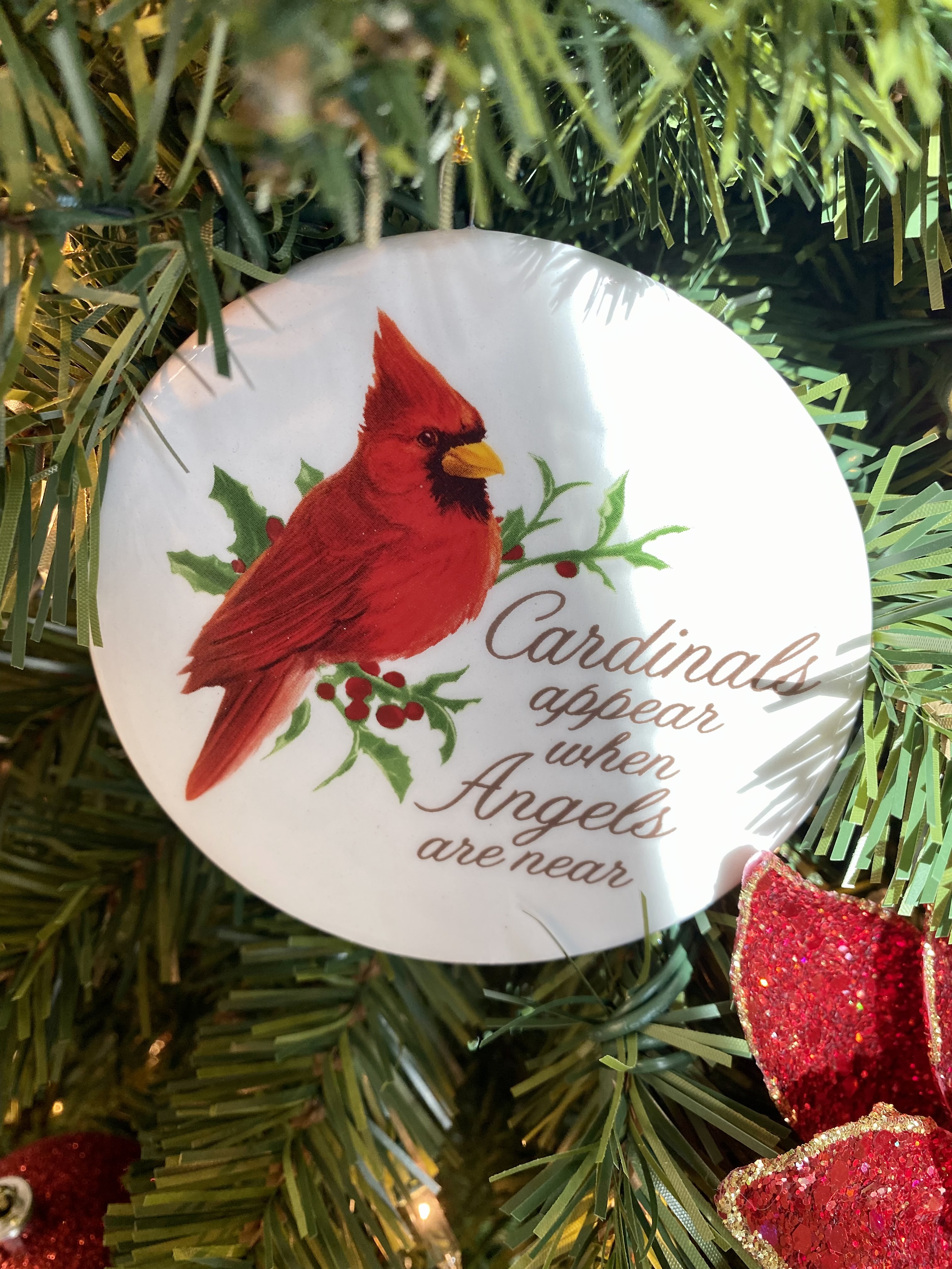 Click to receive a free personalized cardinal ornament from Fox & Weeks 